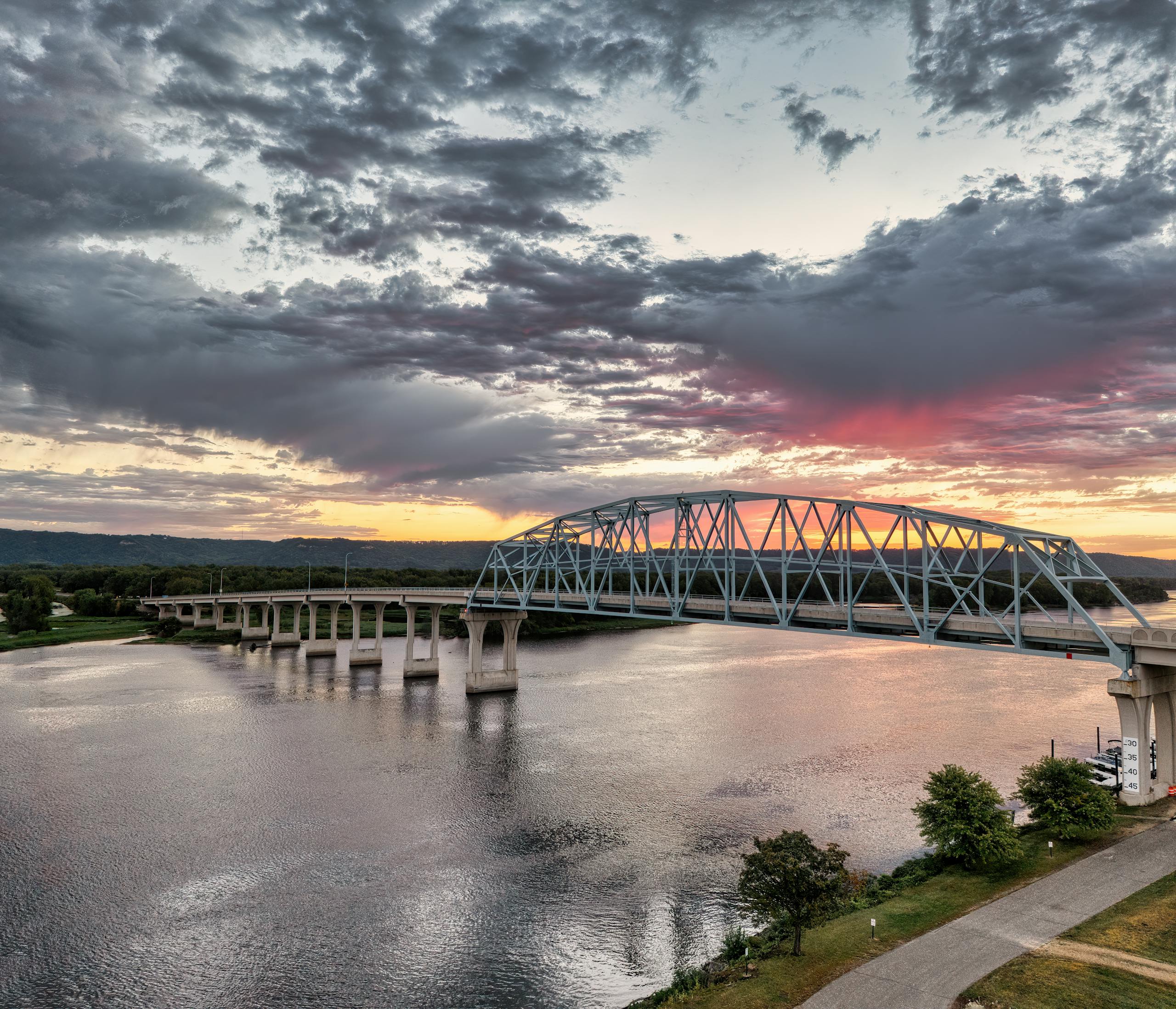 Stunning sunset view of a bridge spanning the Mississippi River in Wabasha, Minnesota.